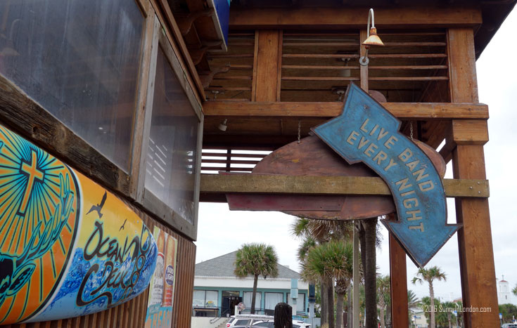 Eating Gator Bites at Ocean Deck, a beach bar in Daytona Beach, Florida