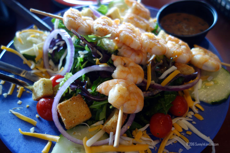 Eating Gator Bites at Ocean Deck, a beach bar in Daytona Beach, Florida