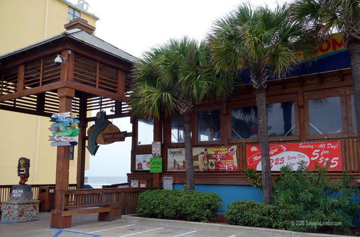 Eating Gator Bites at Ocean Deck, a beach bar in Daytona Beach, Florida